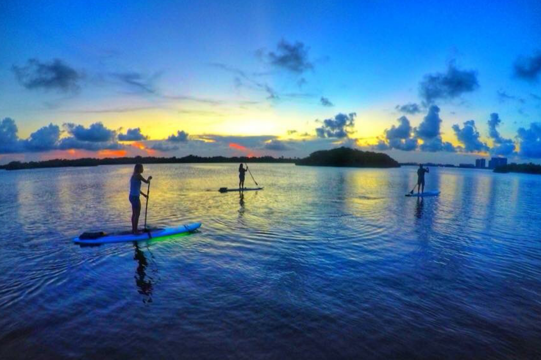 sunset paddle boarding singer island